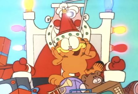 Garfield on a gift-giving throne, from A Garfield Christmas